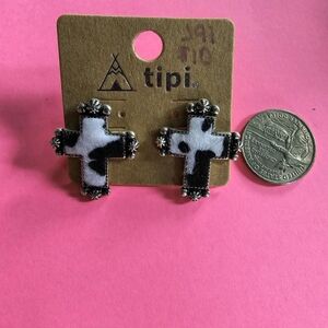 Faux silver and cow print cross earrings